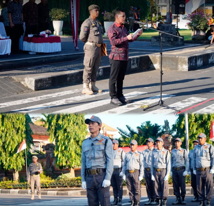 Bupati Klungkung, I Made Satria, membuka Lomba Keterampilan Baris-Berbaris (LKBB) Antar-Satlinmas Tingkat Kabupaten Klungkung 2026 di Depan Monumen Ida Dewa Agung Jambe